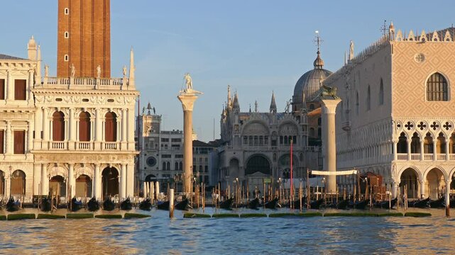 View from water taxi over Venetian Lagoon in front of Riva degli Schiavoni and St Mark's Square, Venice, Italy