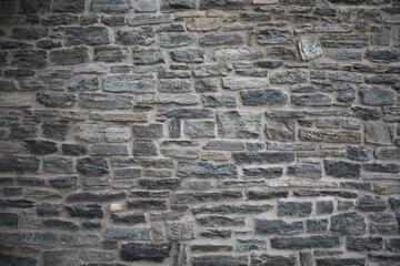 Оld Dry Stone Wall. Traditional old dry stone wall constructed without mortar or cement