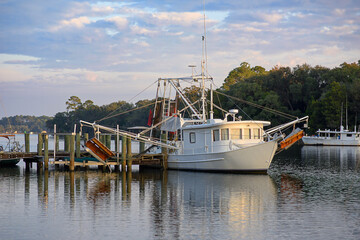 A hardworking shrimp boat docked