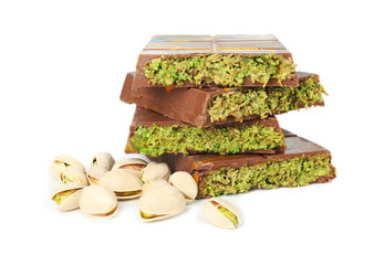 Pieces of Dubai chocolate bars and pistachios isolated on white