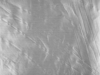 Shiny, reflective aluminum foil surface.