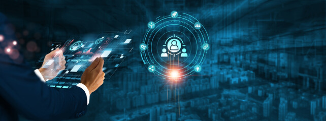 Business Targeting: Businessman holding virtual interface panel of digital device on global...