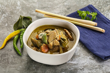 Thai green curry soup with basil