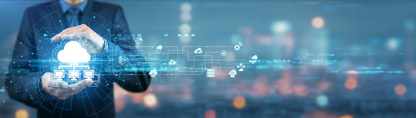 Businessman holding cloud computing infrastructure, technology solutions, digital transformation, data management, servers, network security, IT solutions, cloud platforms, software as a service.