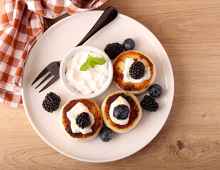 Traditional Ukrainian cottage cheese and raisin fritters
