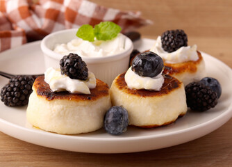 Traditional Ukrainian cottage cheese and raisin fritters