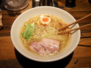 Delicious Ramen Bowl on Wooden Plank in Tokyo Restaurant - Perfect for Food Lovers !