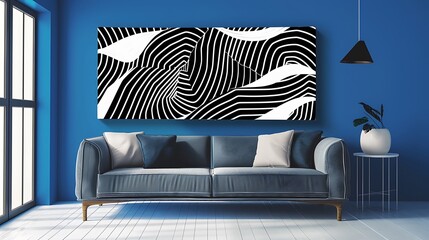 Abstract black and white artwork above a modern gray sofa