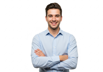 A professional young man with neatly styled hair, wearing a light blue shirt, standing with arms crossed and smiling warmly isolated on transparent background