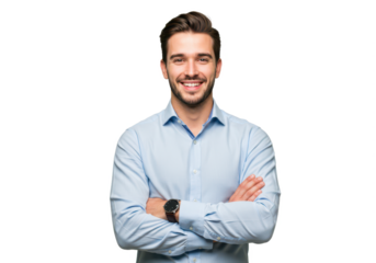 A professional young man with neatly styled hair, wearing a light blue shirt, standing with arms crossed and smiling warmly isolated on transparent background