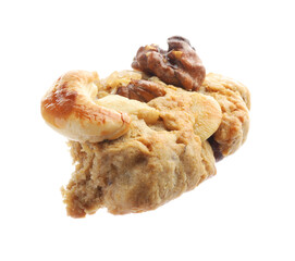 Piece of tasty cookie with nuts isolated on white