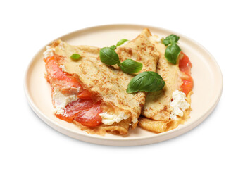 Delicious crepes with salmon, cream cheese and basil isolated on white
