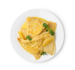 Plate with tasty crepes Suzette isolated on white, top view