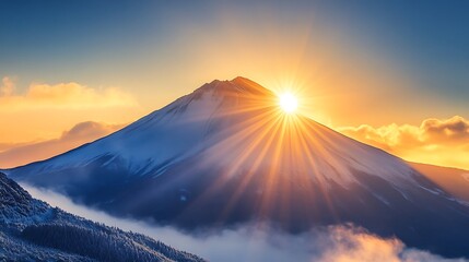 A mountain peak dusted with snow under a bright winter sun.