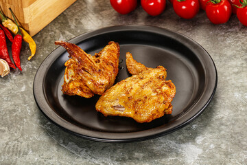 Tasty roasted chicken wing with spices