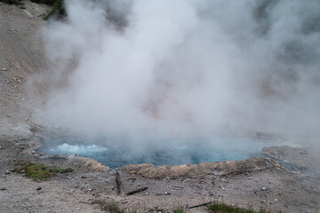 Beautiful deep blue colors and sedimentary rim of the various hot springs within Yellowstone National park