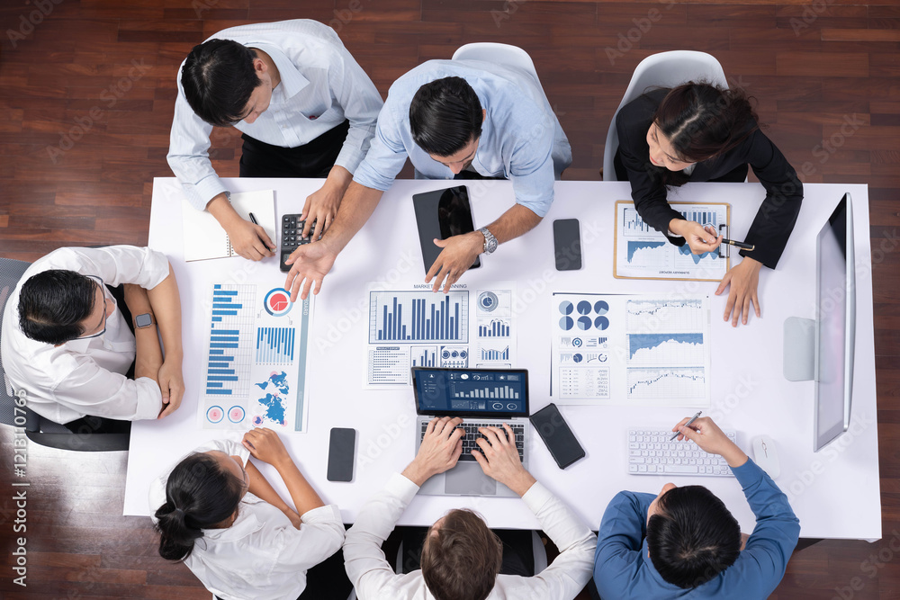Leinwandbilder top view analyst team utilizing bi fintech to analyze financial data at table in meeting room. analy