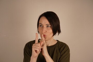 Big secret. Beautiful woman little smiling, telling secret. Expression emotion and feelings...