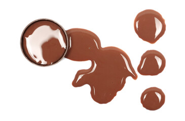 Spilled chocolate milk puddle and bottle cap isolated on white background, top view
