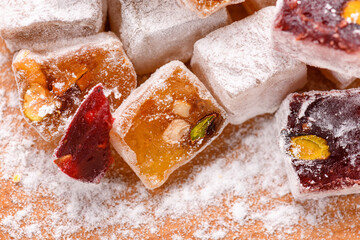 Sweet food Turkish delight, assorted rahat locum in form of cubes with nuts and powdered sugar, traditional food