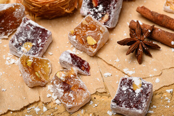 Sweet food Turkish delight on wooden background, assorted locum and candy for decorated backdrop