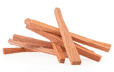 Pile of sandalwood sticks isolated on a white background. Chandan. Incense.