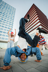 Vertical. Exciting Breakdancing Scene Featuring Talented Performers Demonstrating Their HipHop...