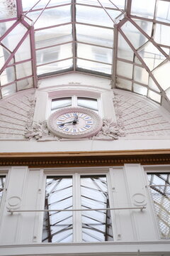 A beautiful clock in a Parisian covered passage. Paris, France - January 16, 2025.