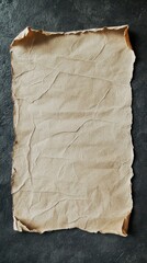 A textured, crumpled piece of parchment paper with a rustic appearance.