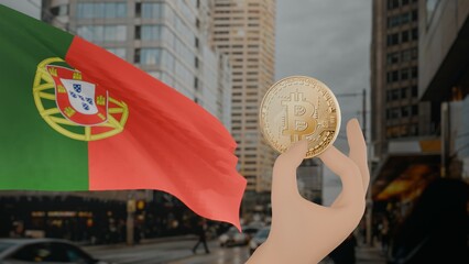 Golden bitcoin held by a hand with a waving Portugal flag in the background against a modern urban...
