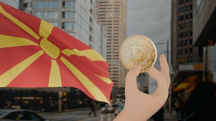 Golden bitcoin held by a hand with a waving Republic of Macedonia flag in the background against a...