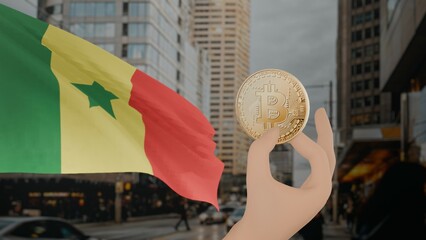 Golden bitcoin held by a hand with a waving Senegal flag in the background against a modern urban...