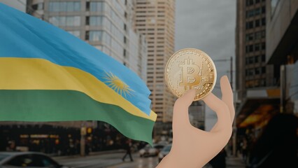Golden bitcoin held by a hand with a waving Rwanda flag in the background against a modern urban...