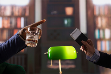 Secret service agents examine a secure hard drive to protect data storage and access in high stakes missions. Intelligence professionals review classified evidence on a storage unit. Close up.