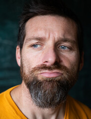 handsome man portrait on a dark background