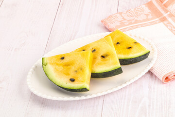 Sweet and juicy yellow watermelon slices
