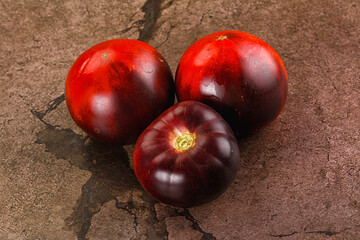 Black ripe juicy organic tomato