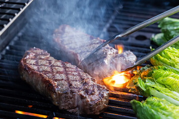 Grilling steak and romaine lettuce during a backyard barbecue