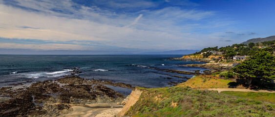 Coastal bluffs over the Pacific Ocean with rocky shores, Moss Beach Califronia