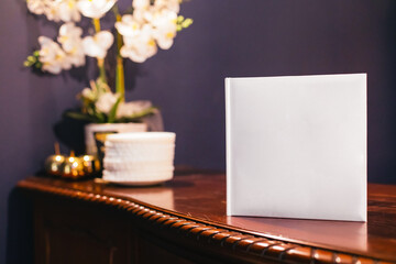 A book with a white cover on the table