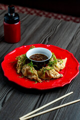 Golden Gyozas on a Rustic Plate