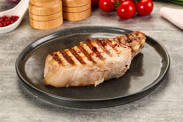 Grilled pork loin steak with bone