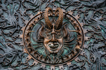 Une visite de Gruyère, un mur de démonique