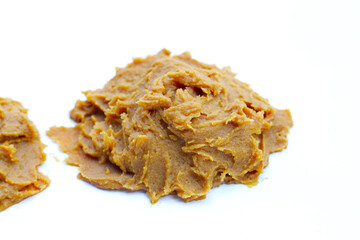 Japanese miso paste on white background.