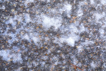 水たまりに出来たデザイン的な雪氷模様