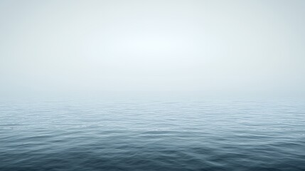Obraz premium Misty Ocean Serenity: A Tranquil Seascape