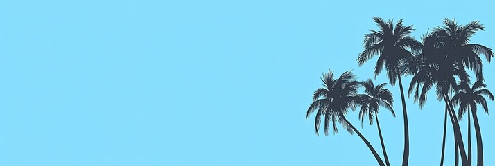 Fototapeta premium Silhouette of palm trees against a light blue sky.