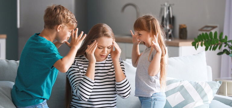 Angry children scolding their mother at home