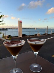 Espresso martini cocktail on the beach