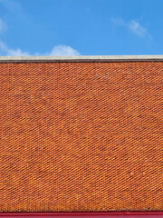 tile roof of temple with sky